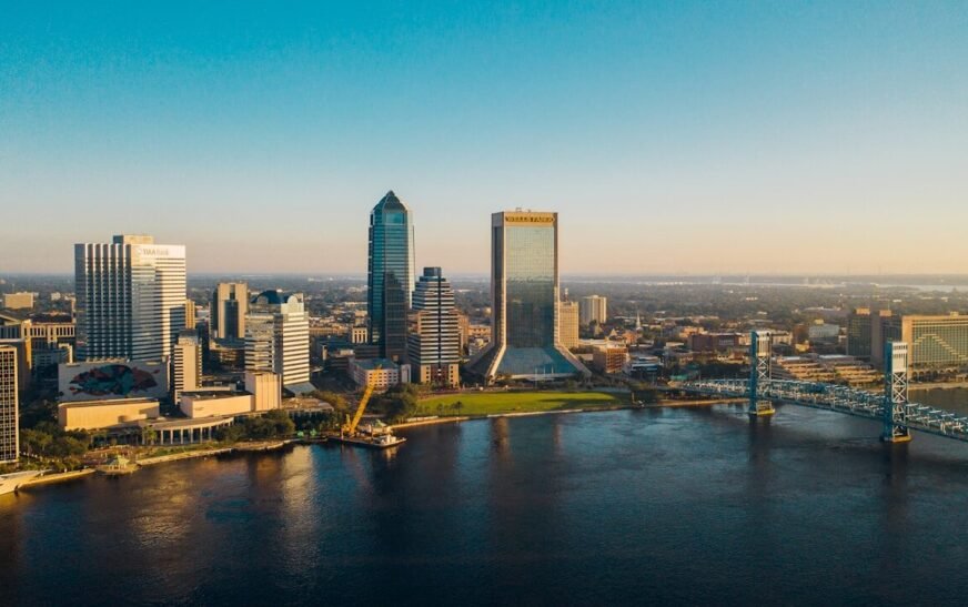 city skyline under blue sky during daytime