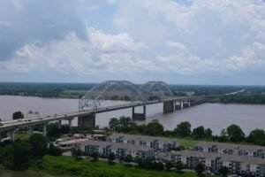 Aerial photo of the Hernando de Soto Bridge spanning the Mississippi River in Memphis, Tennessee.