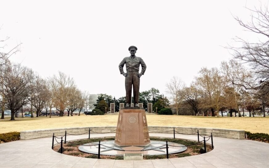 man statue on brown concrete floor