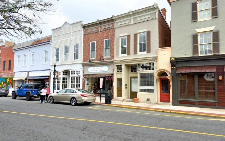 a row of buildings on a city street