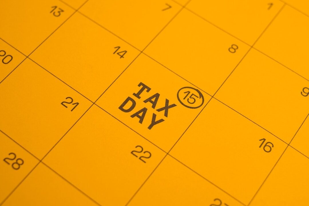 Calendar shows "tax day" circled on the 15th.