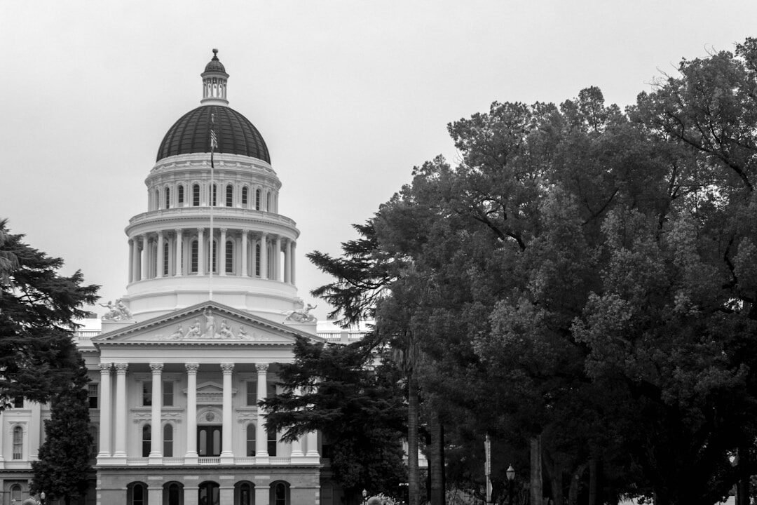 California state capitol building with trees in foreground