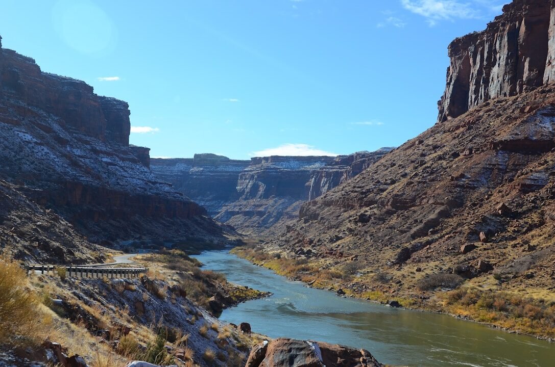 A river running through a canyon surrounded by mountains