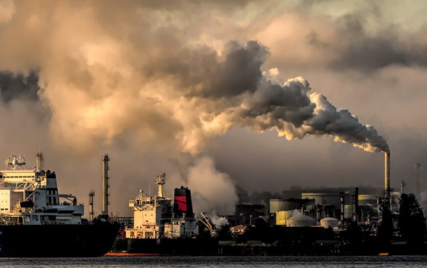 industrial harbor with smokestack pollution